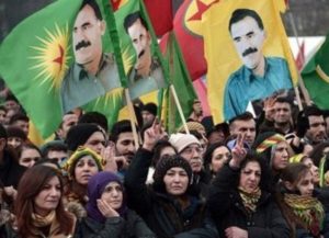 Members of the Kurdish community wave flags and banners of convicted Kurdistan Worker's Party (PKK) leader Abdullah Ocalan during a demonstration calling for Ocalan's release in Strasbourg, Eastern France, on February 14, 2015.   Ocalan was captured by Turkish undercover agents in Kenya in 1999, brought back to Turkey and sentenced to death. His sentence was later commuted to life.  AFP PHOTO/FREDERICK FLORIN        (Photo credit should read FREDERICK FLORIN/AFP/Getty Images)